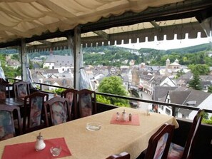Breakfast, lunch, dinner served; local cuisine, al fresco dining