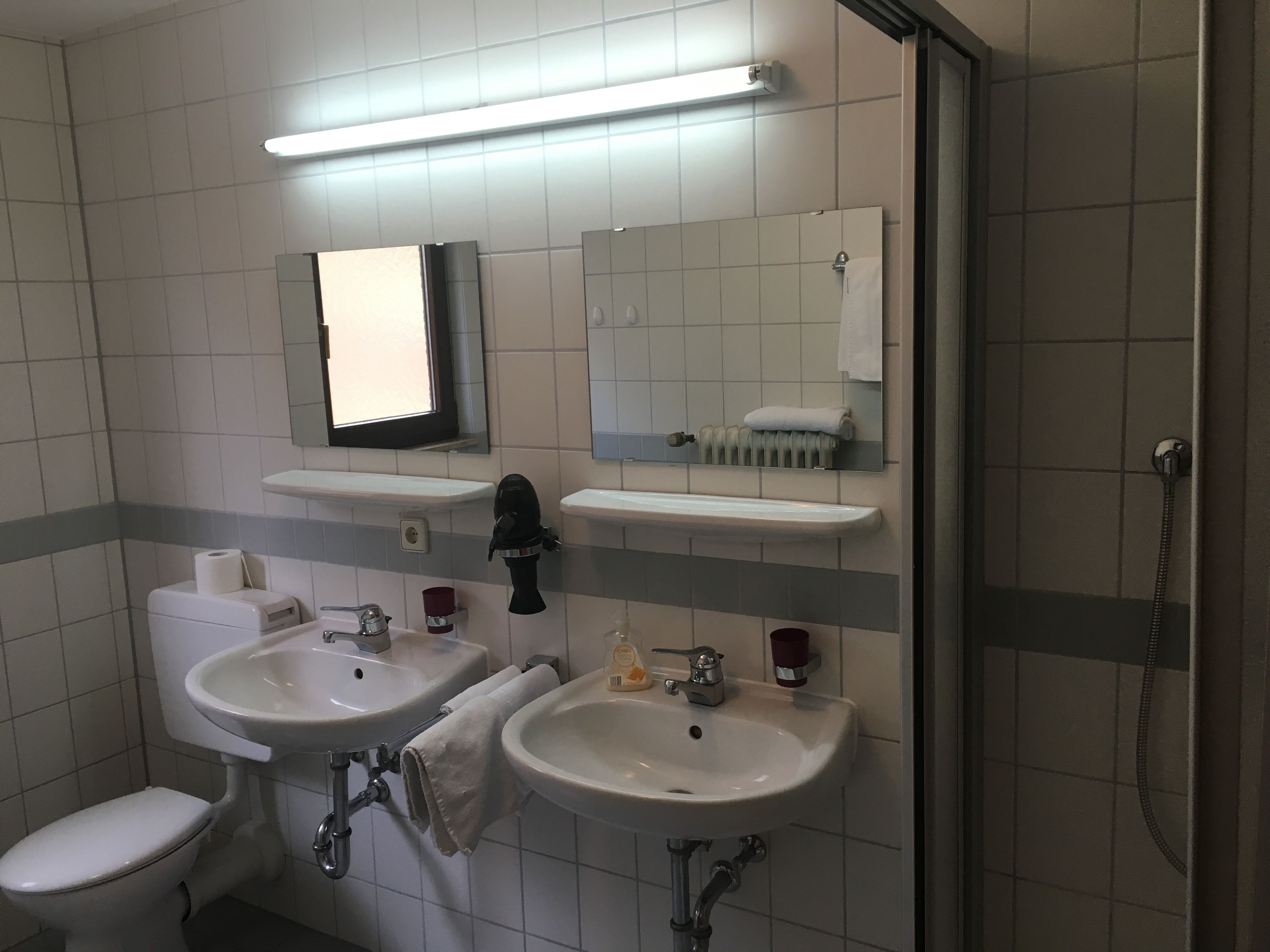family room | bathroom | shower, free toiletries, hair dryer, towels