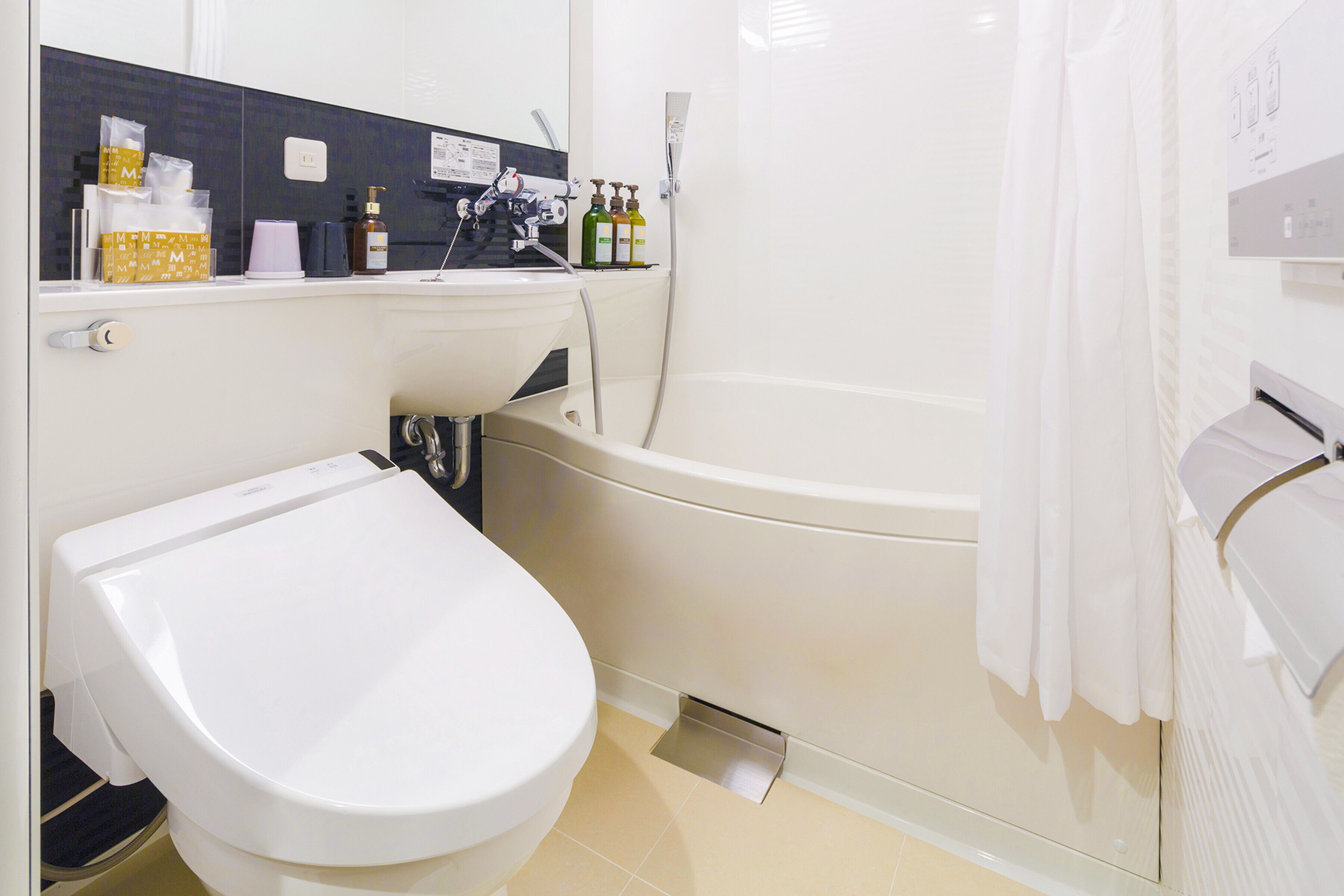 free toiletries, hair dryer, slippers, bidet