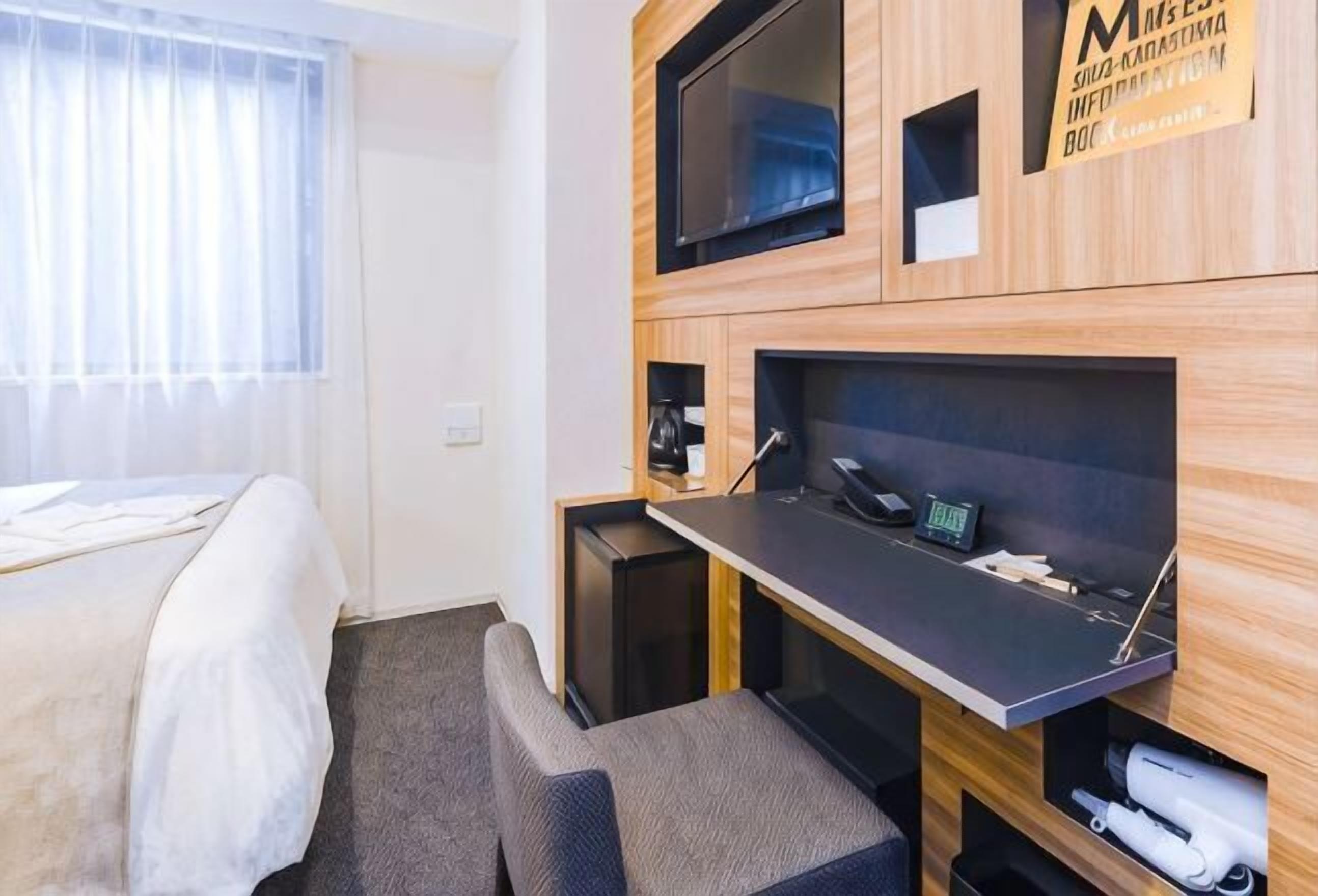 Premium bedding, down duvets, in-room safe, desk