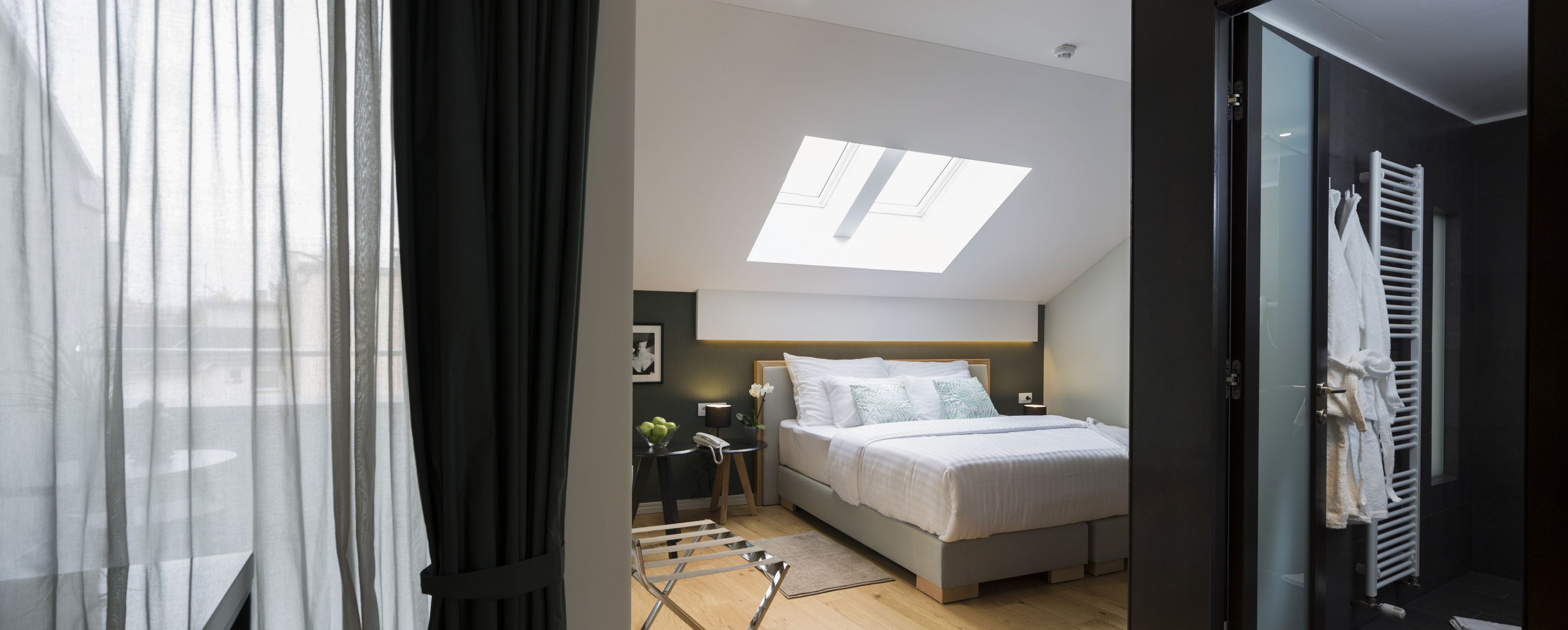 deluxe double or twin room, balcony, city view | premium bedding, minibar, in-room safe, desk