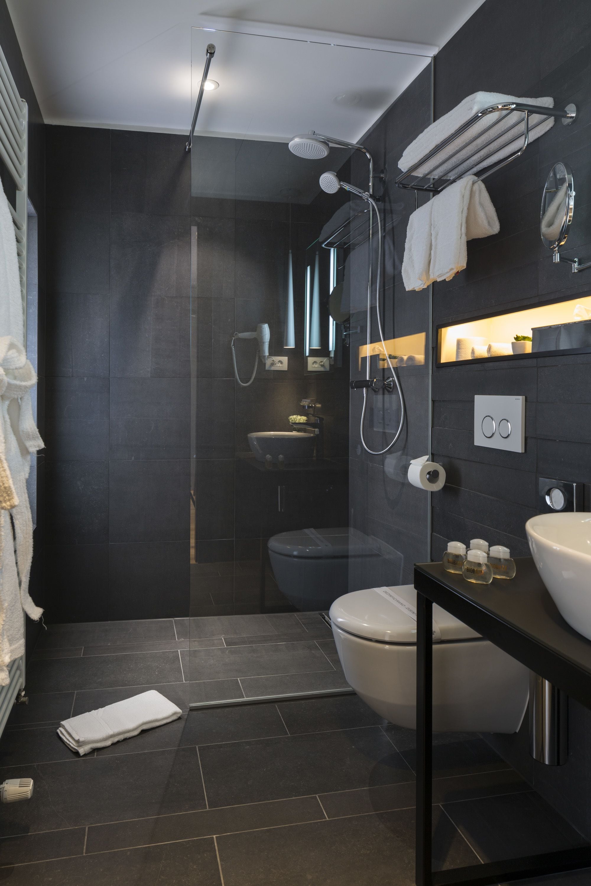 junior suite, 1 king bed, hot tub, city view | bathroom | free toiletries, hair dryer, slippers, towels