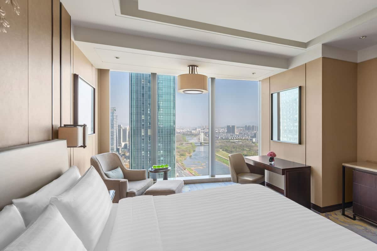 deluxe river view king room | 1 bedroom, premium bedding, minibar, desk