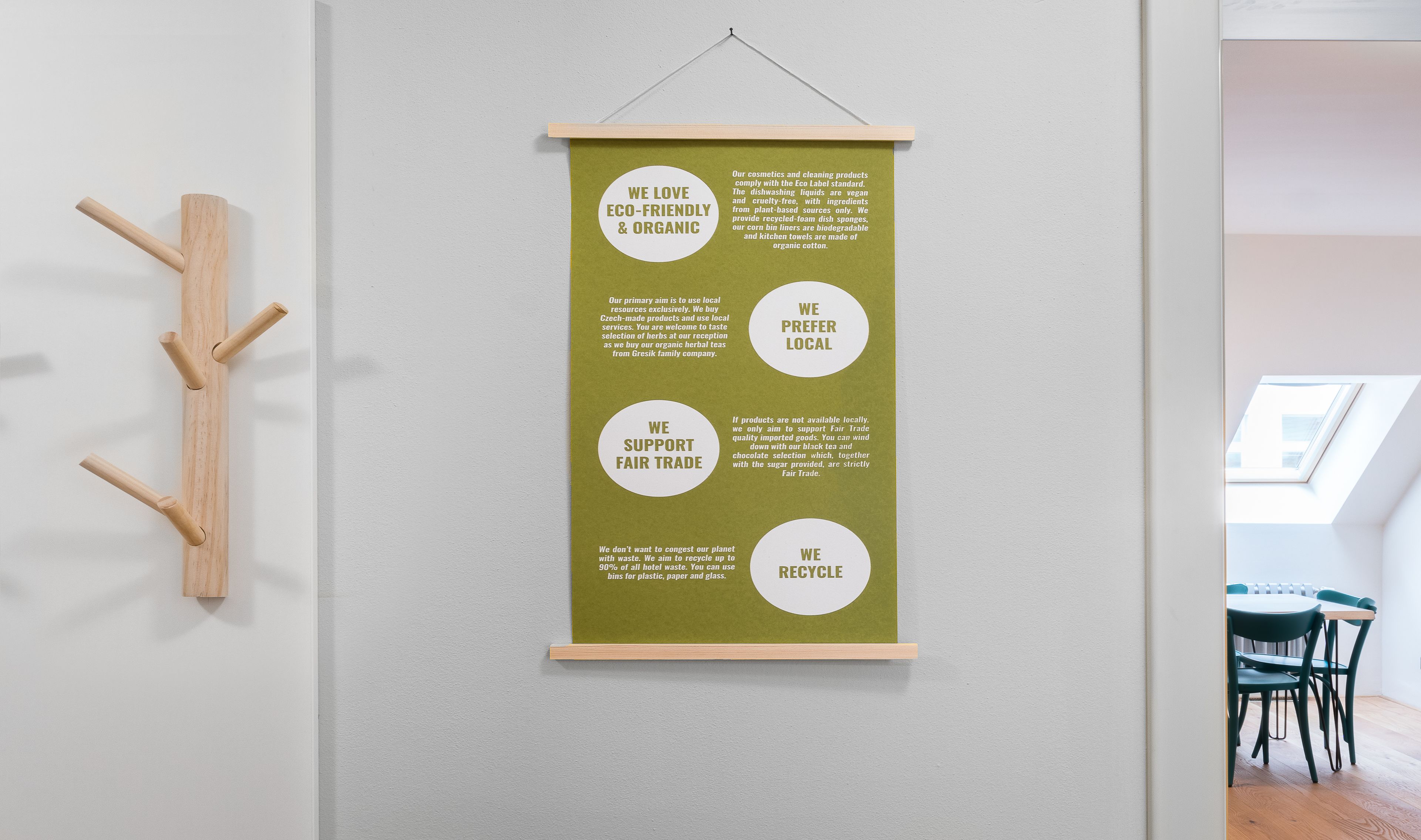 A wall-mounted poster with eco-friendly messages.