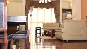 Luxury Apartment, 2 Bedrooms | Living room | 43-inch Smart TV with satellite channels, TV, fireplace