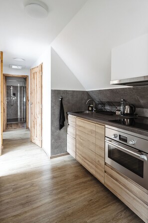 Premium Family Suite with Kitchenette | Private kitchenette | Mini-fridge - Hotel Frýdl (Prague)