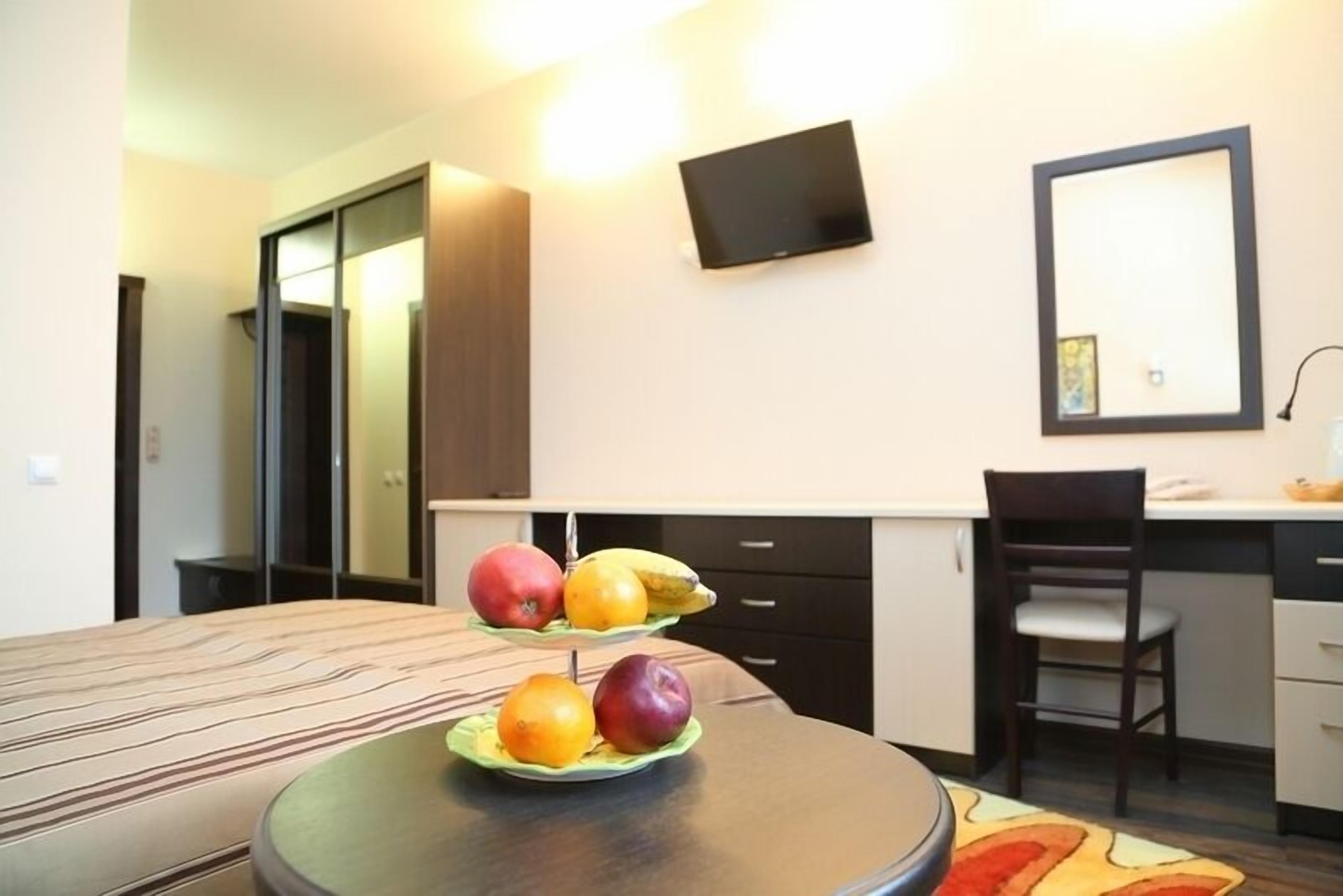 Minibar, desk, laptop workspace, iron/ironing board