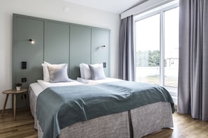 Appartamento, 1 camera da letto, terrazzo | Tende oscuranti, ferro/asse da stiro, Wi-Fi gratuito, lenzuola