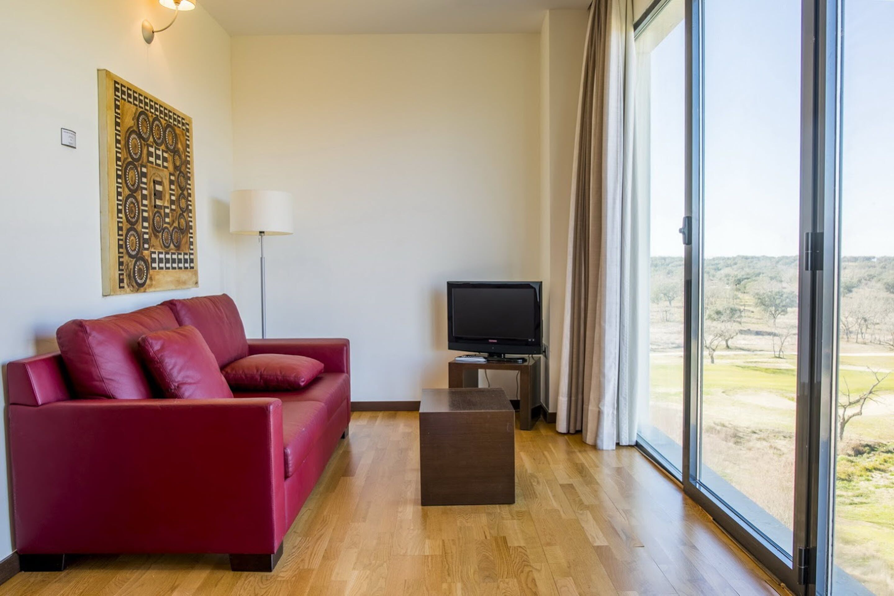 junior suite | living room | 32-inch flat-screen tv with digital channels, tv