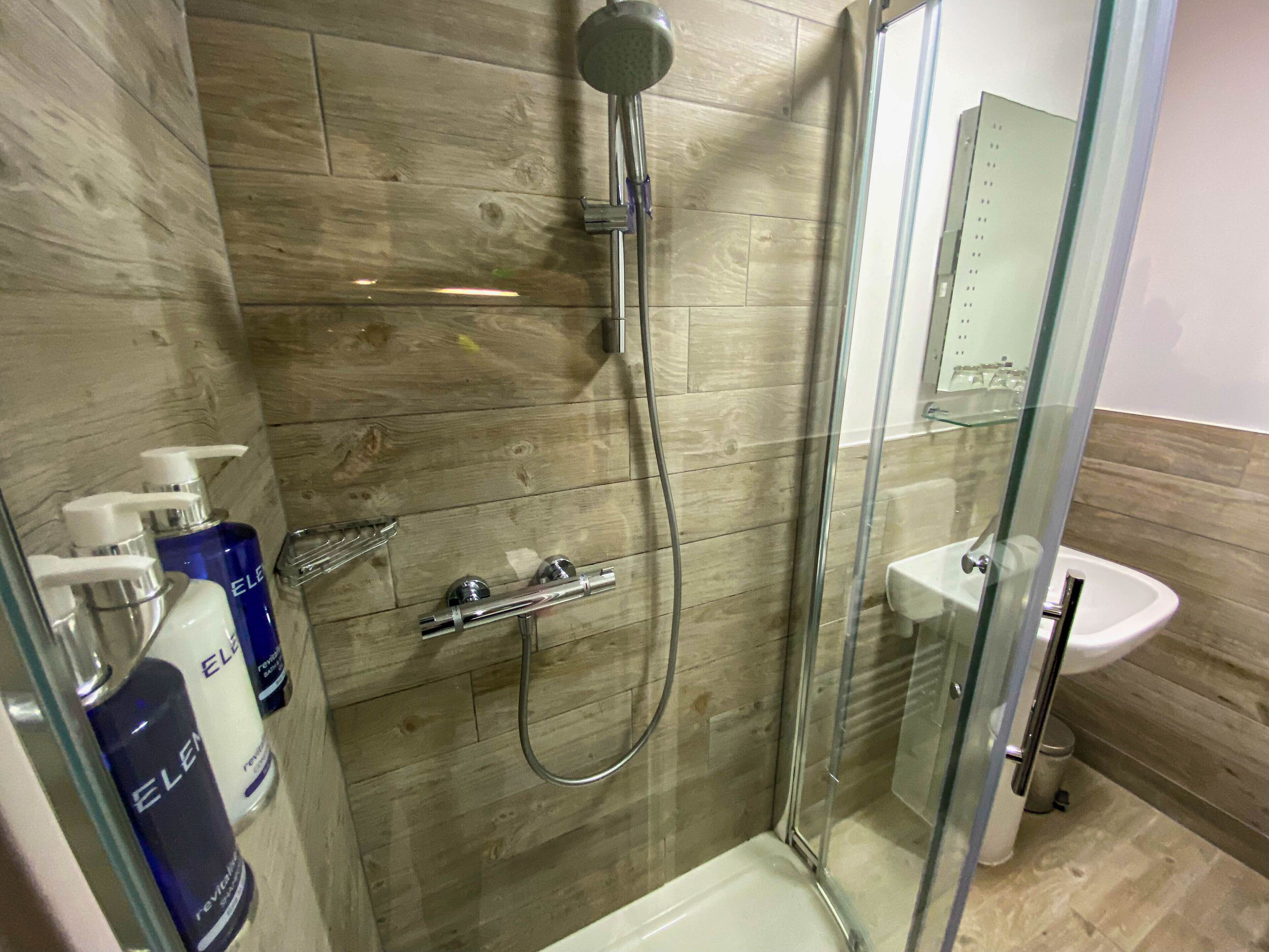 standard double room | bathroom | eco-friendly toiletries, hair dryer, slippers, towels