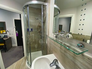 Standard Double Room | Bathroom | Eco-friendly toiletries, hair dryer, slippers, towels