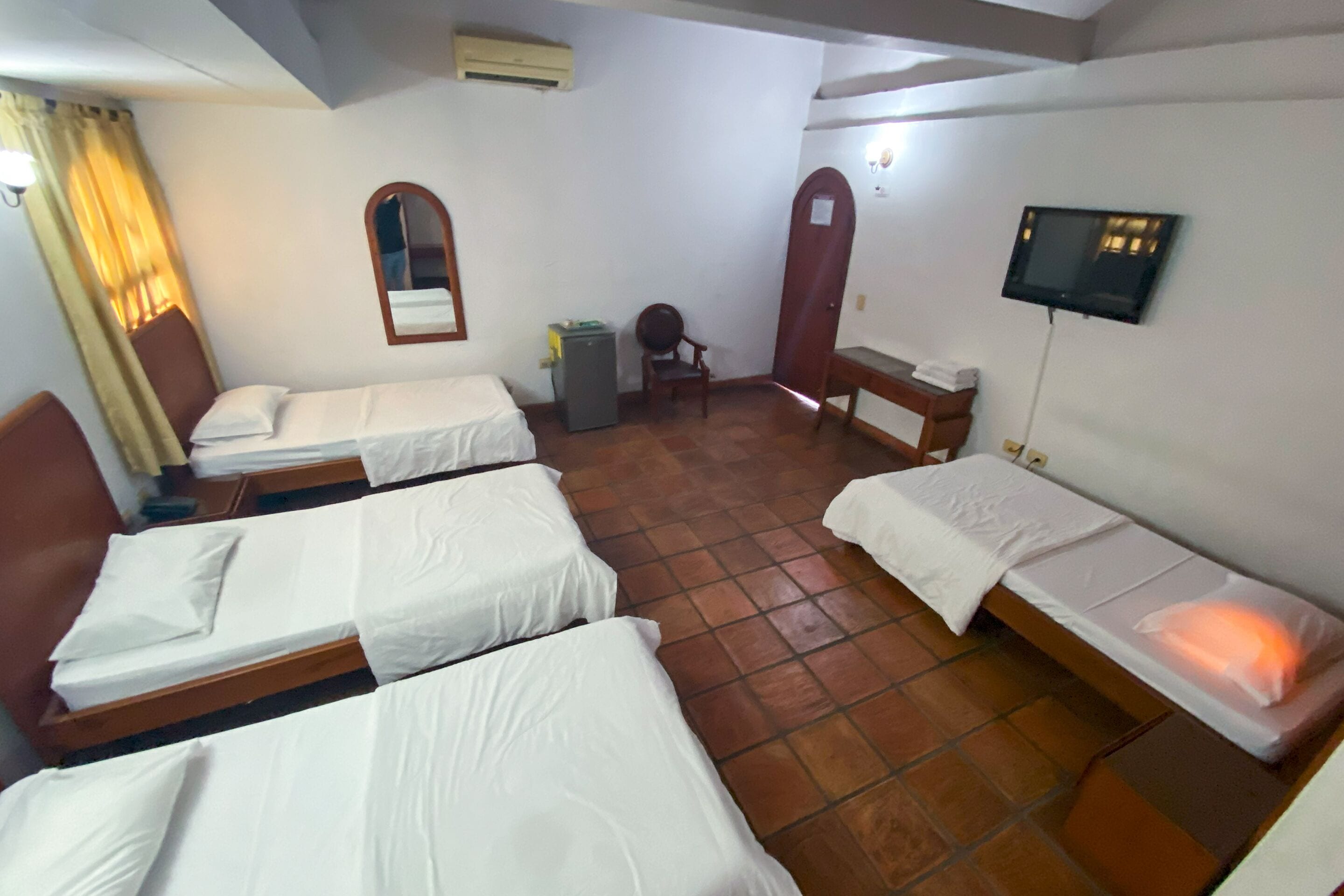 standard quadruple room | minibar, desk, iron/ironing board, free wifi