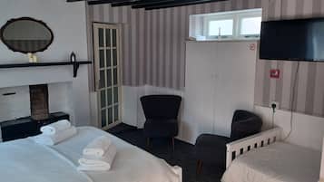 Family Room - Accessible, Ground Floor (Room 6) | Blackout drapes, iron/ironing board, free WiFi, bed sheets