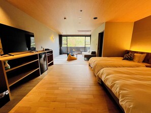 Deluxe kamer | Een kluis op de kamer, verduisterende gordijnen, gratis wifi, beddengoed