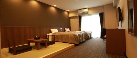 Chambre Quadruple Deluxe, non-fumeurs | 2 chambres, rideaux occultants, Wi-Fi gratuit, draps fournis