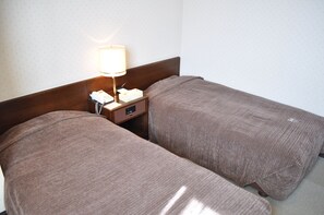 Habitación con 2 camas individuales | Wifi gratis y ropa de cama 