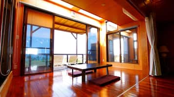 Sun Room Cottage, Non Smoking, Ocean View | Living area | Flat-screen TV