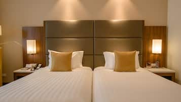 Ropa de cama de alta calidad y minibar
