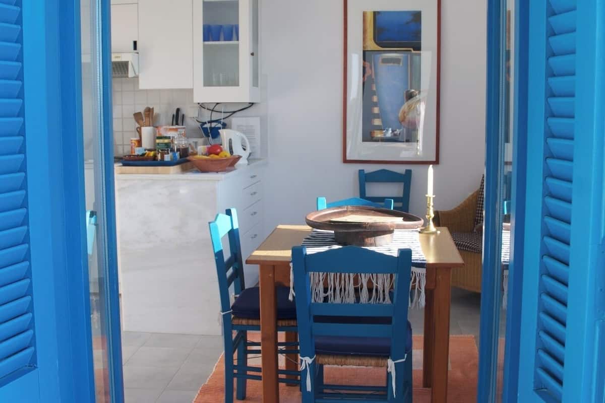 Apartment, 1 Bedroom, Balcony, Sea View | Living area | Flat-screen TV, DVD player, books, music library