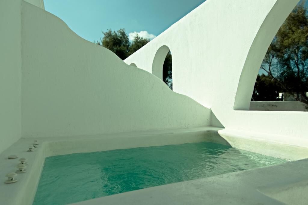 luxury studio suite | premium bedding, in-room safe, iron/ironing board, free wifi