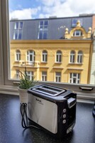 Geladeira, micro-ondas, cooktop, máquina de café expresso