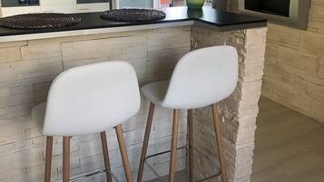 Design Studio, 1 Queen Bed with Sofa bed, Terrace, Ground Floor | In-room dining