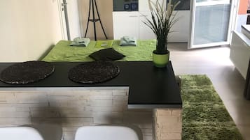 Design Studio, 1 Queen Bed with Sofa bed, Terrace, Ground Floor | In-room dining