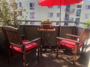 Apartamento família, 1 quarto, sacada | Terraço/pátio