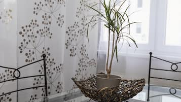 Family Apartment, 1 Bedroom, Balcony | In-room dining