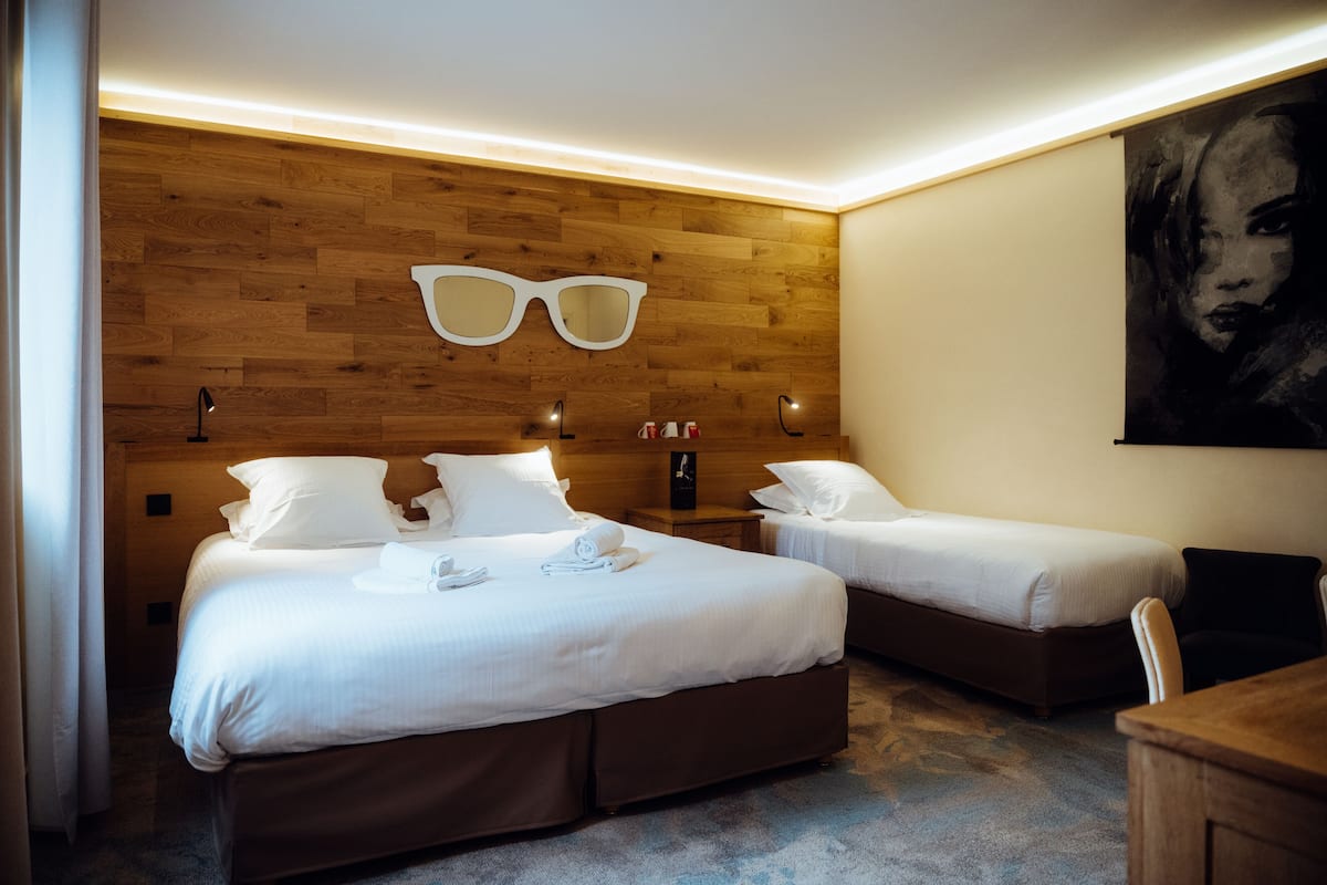 Habitación triple | Insonorización, wifi gratis y ropa de cama