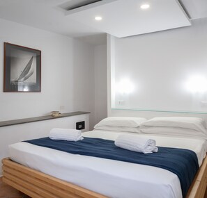 Standard-bungalow | Tallelokero huoneessa, vuodevaatteet