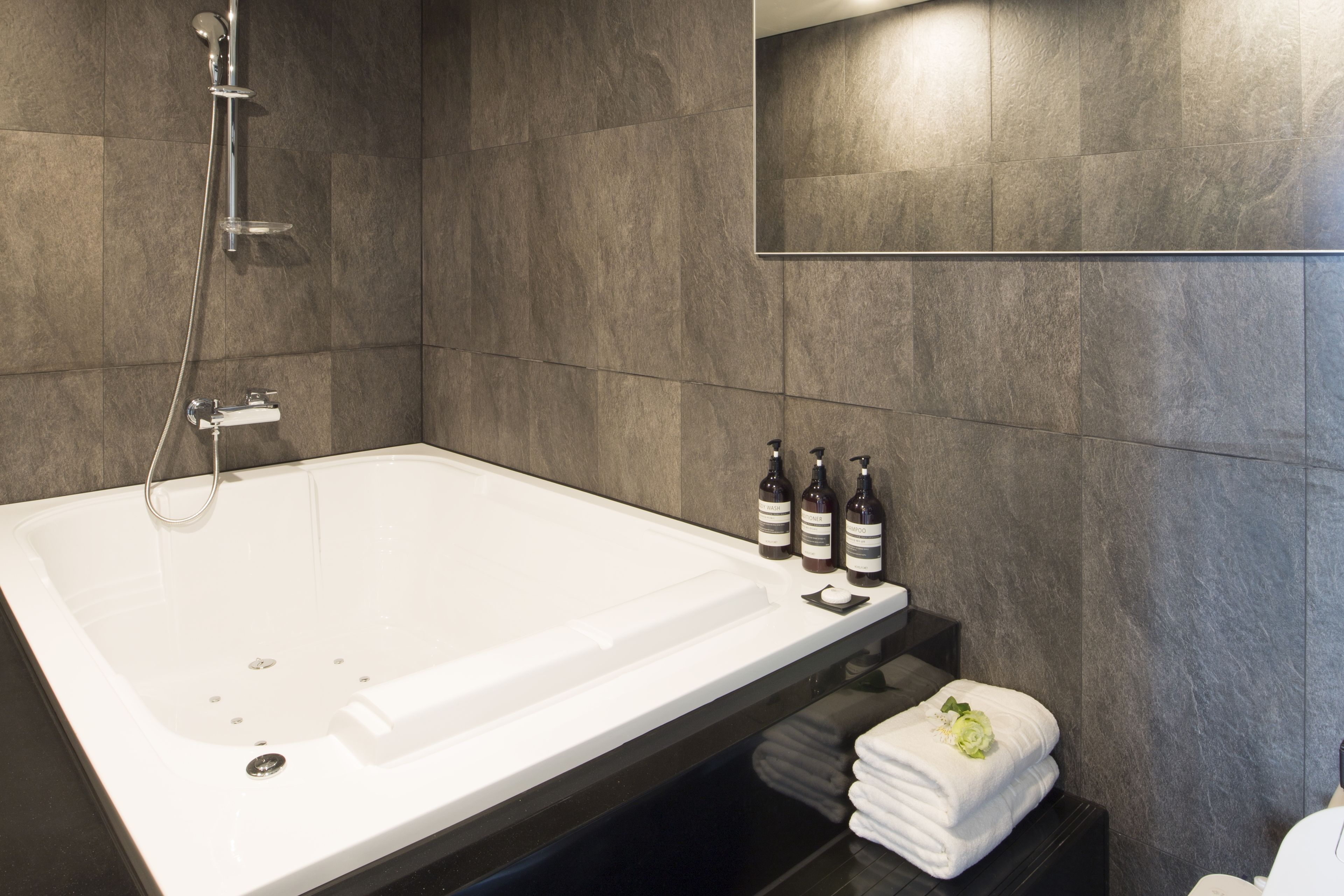 suite | bathroom | shower, hair dryer, bathrobes, slippers