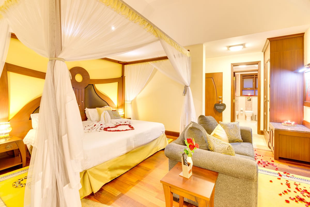 Suite de luna de miel | 1 dormitorio, ropa de cama de alta calidad, minibar y caja fuerte