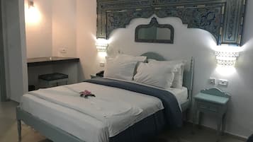 Egyptian cotton sheets, premium bedding, in-room safe, desk