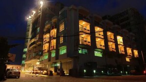 A multi-story hotel with balconies and a ground-level entrance. - Abyssinia Renaissance Hotel (Addis Ababa)