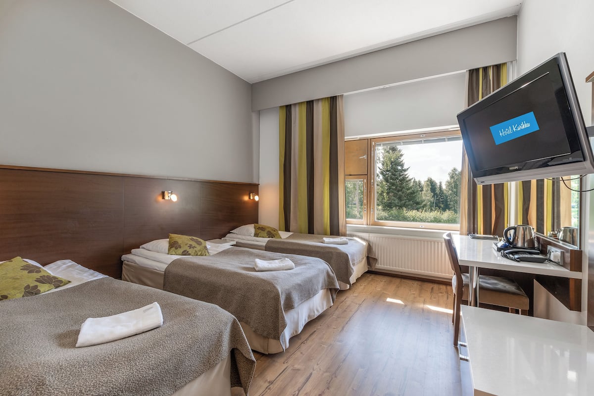 Minibar, desk, laptop workspace, blackout curtains
