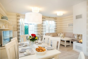 House, 3 Bedrooms, Sauna (Zingster Perle III - Bahnhofstr. 24) | Living area | Flat-screen TV, fireplace