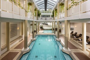 Indoor pool, outdoor pool, pool umbrellas, sun loungers