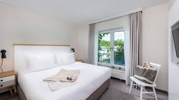 Ropa de cama hipoalergénica, cortinas blackout y wifi gratis