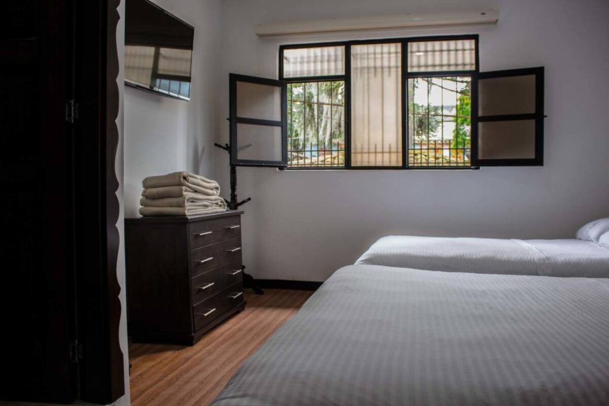 Double Room, 2 Double Beds | In-room safe, free cribs/infant beds, free WiFi