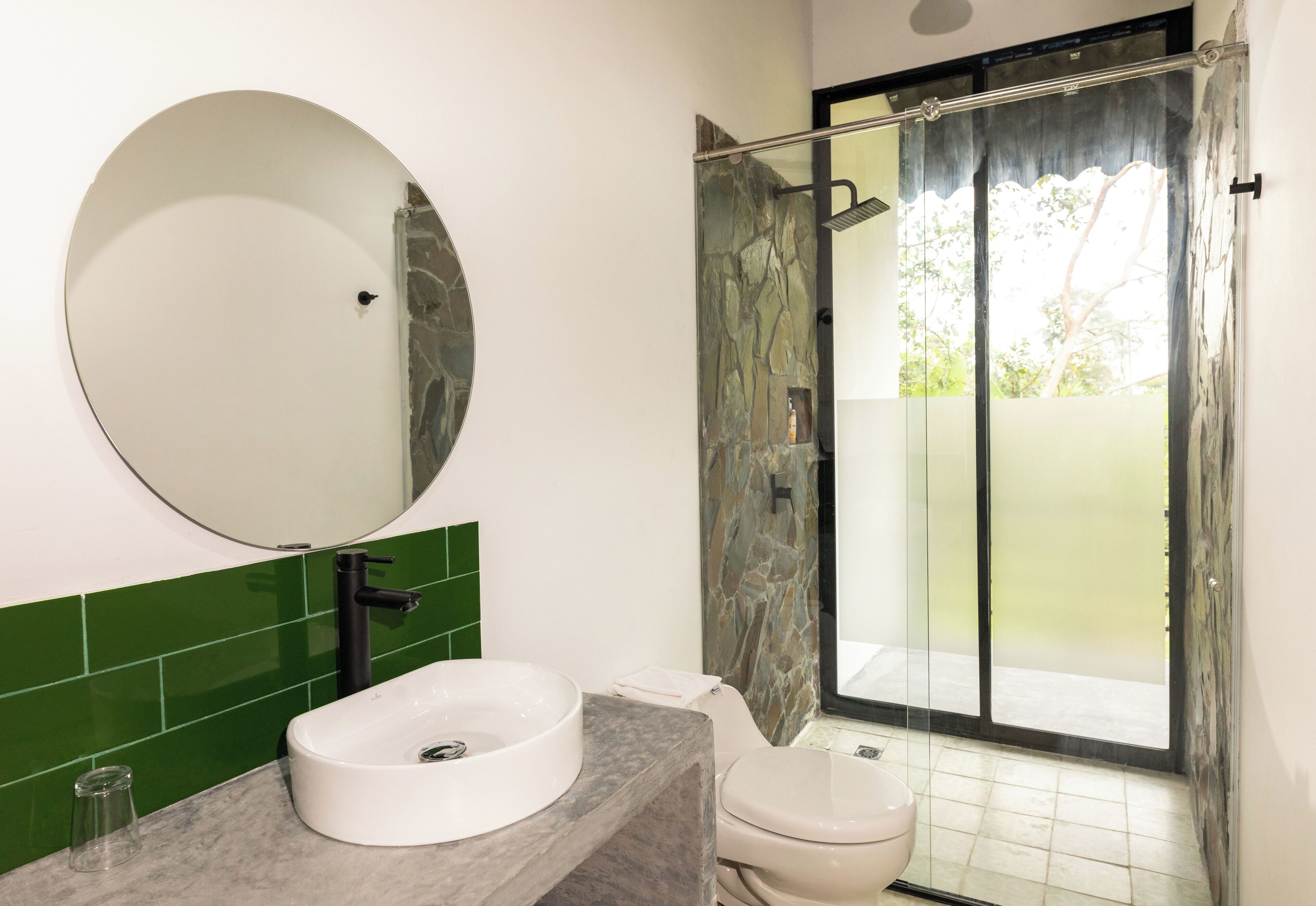 luxury room | bathroom | shower, designer toiletries, towels, toilet paper