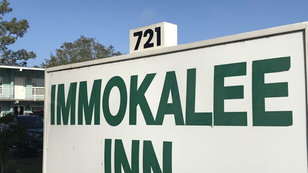 A sign for the Immokalee Inn with the number 721 on top. - Immokalee Inn (Immokalee)
