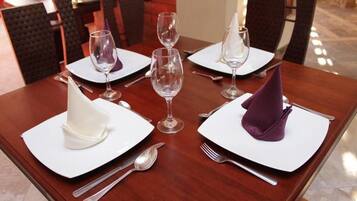 Breakfast and dinner served, local cuisine