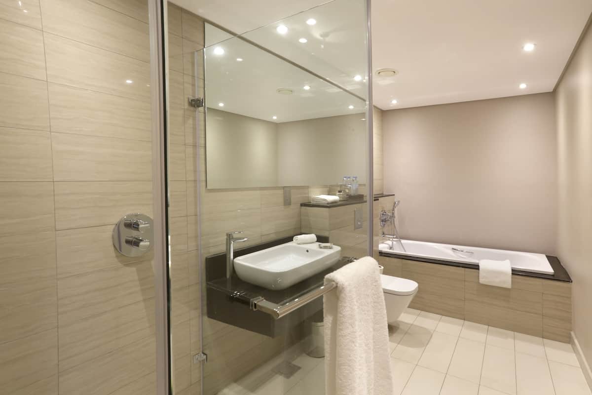 hair dryer, slippers, towels, soap