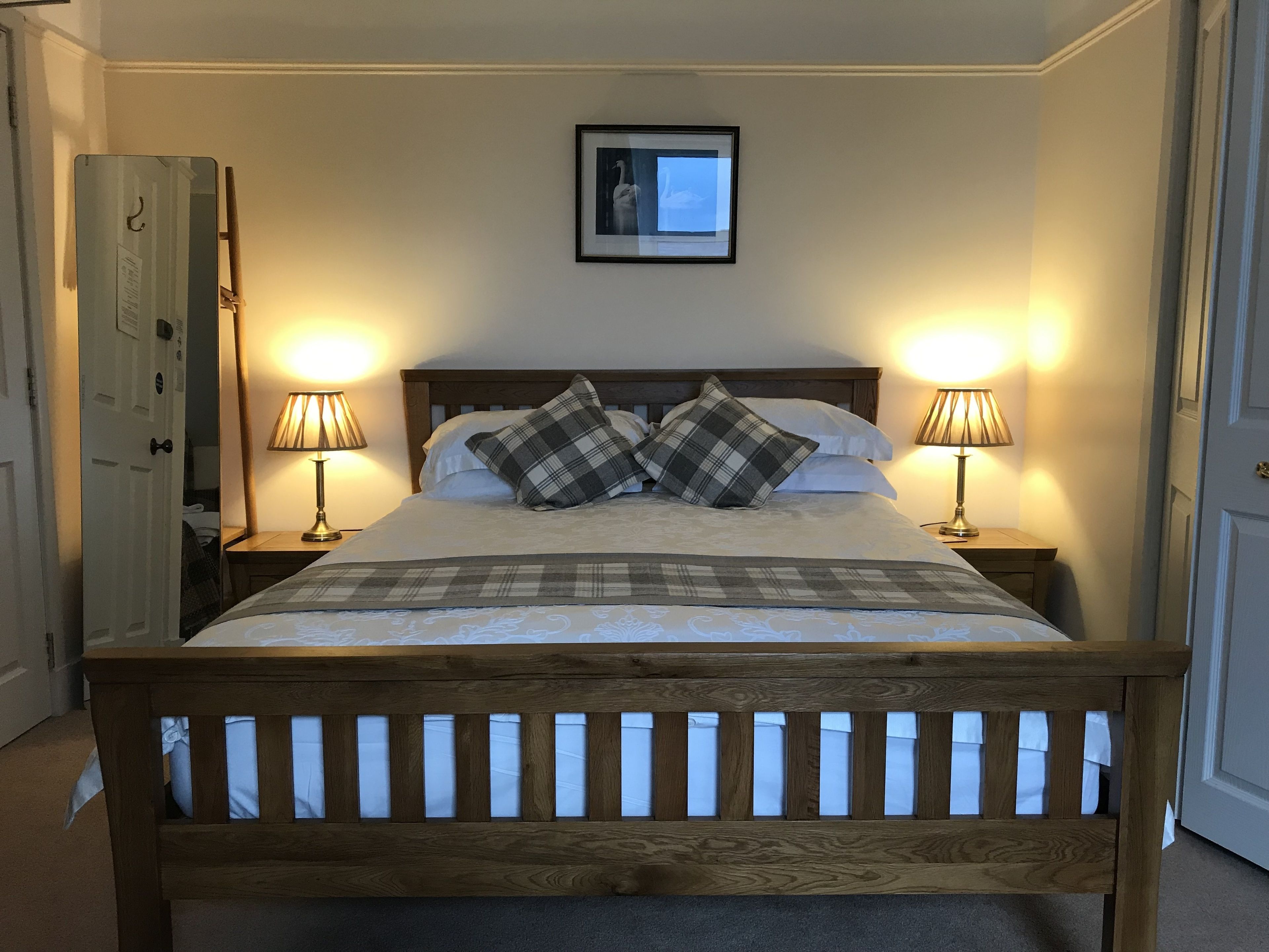 Family Room | Premium bedding, desk, laptop workspace, free WiFi