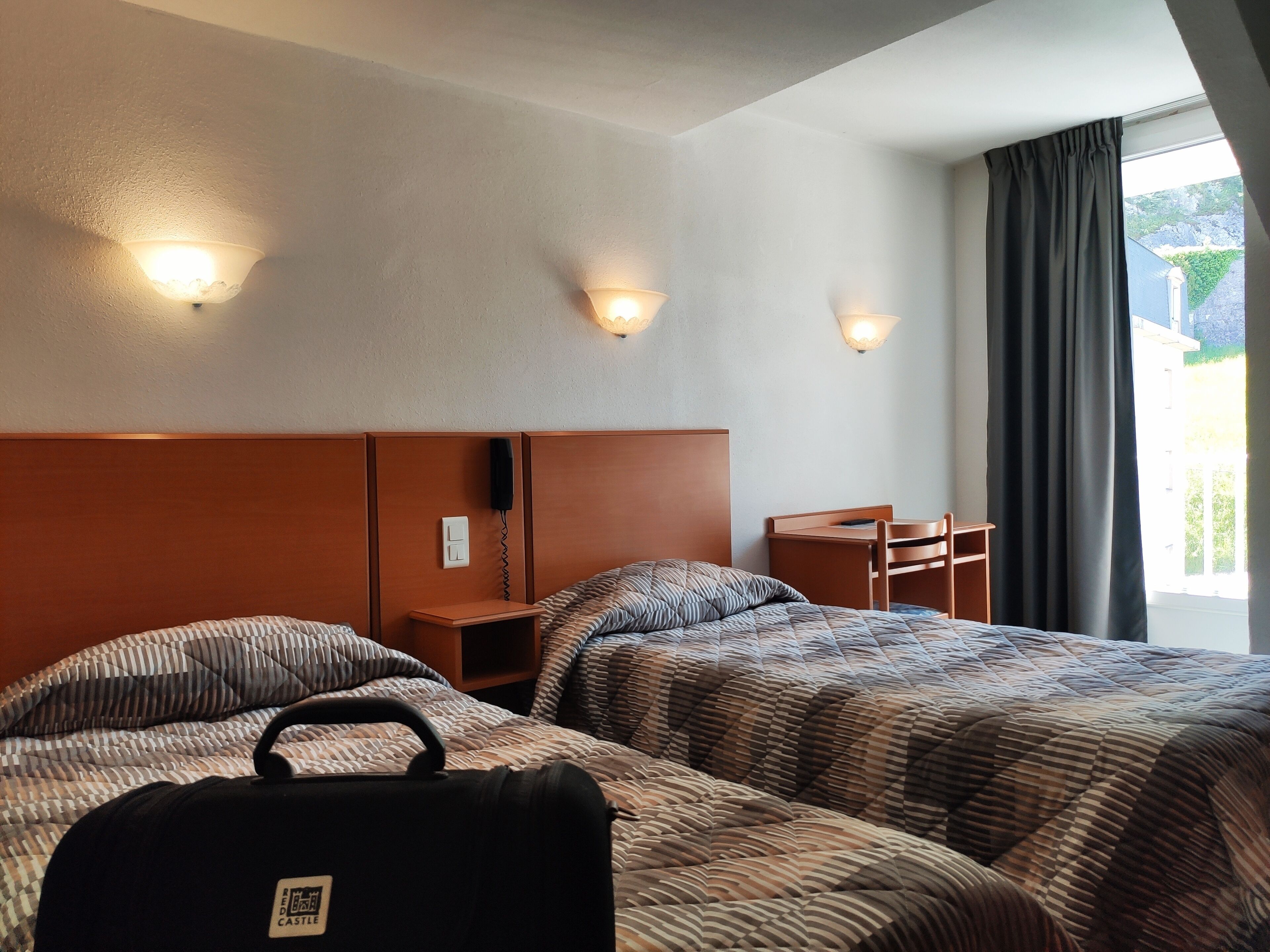 desk, blackout curtains, soundproofing, iron/ironing board