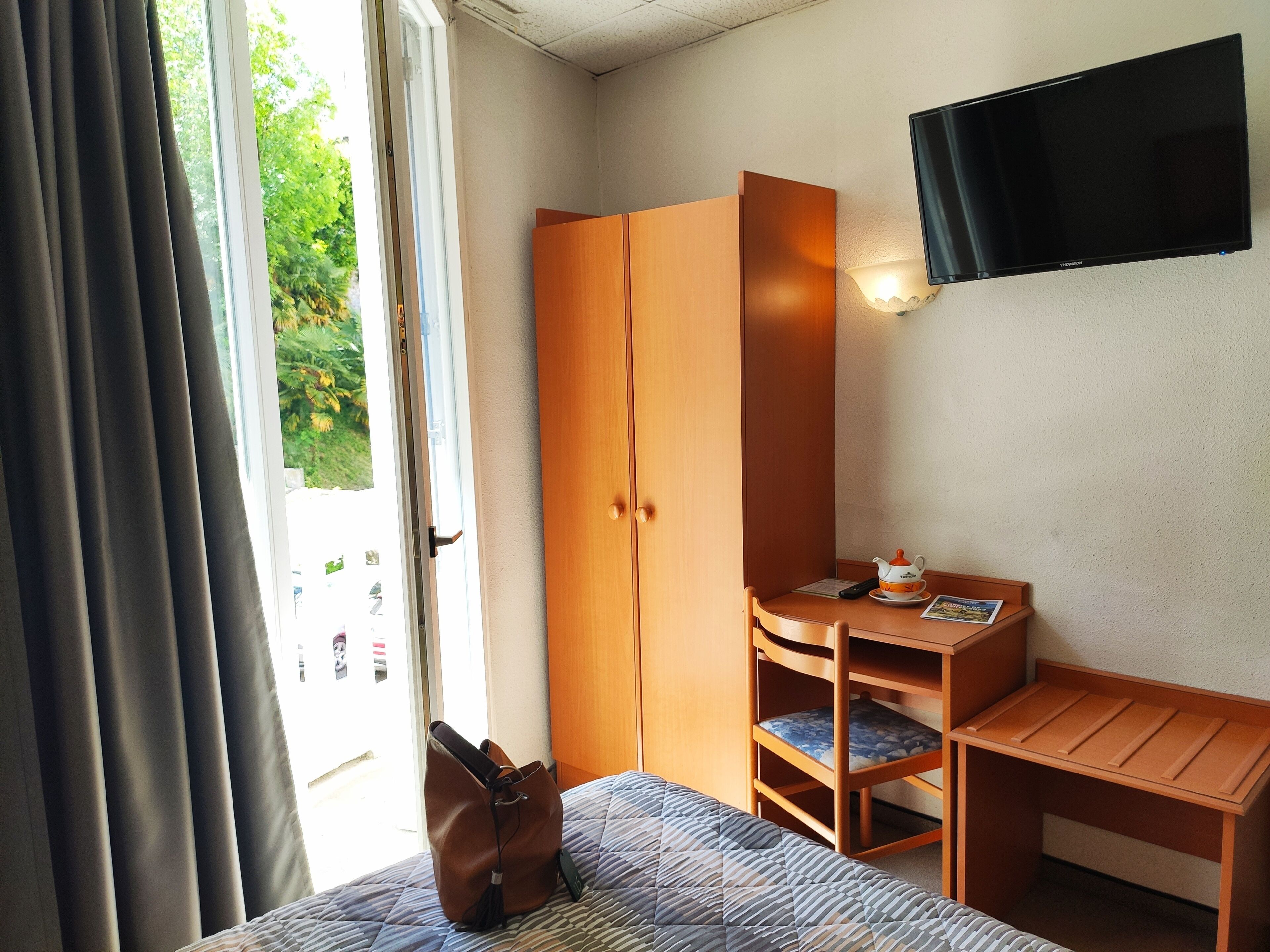 desk, blackout curtains, soundproofing, iron/ironing board