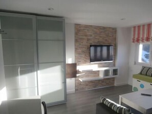 Apartamento, 2 quartos | Área de estar