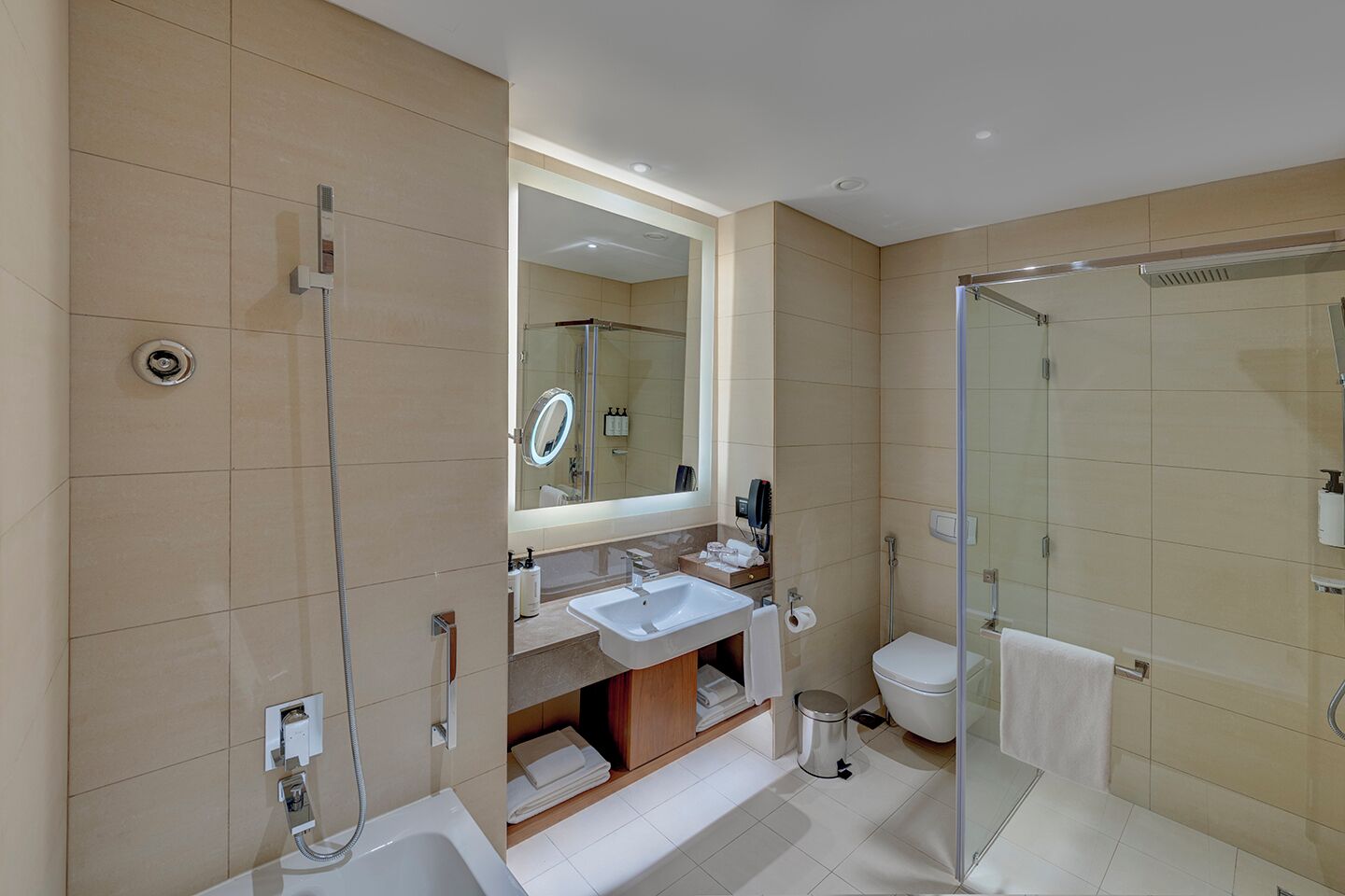 Separate tub and shower, rainfall showerhead, eco-friendly toiletries
