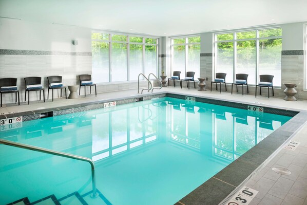 Indoor pool, open 7 AM to 10 PM, pool loungers